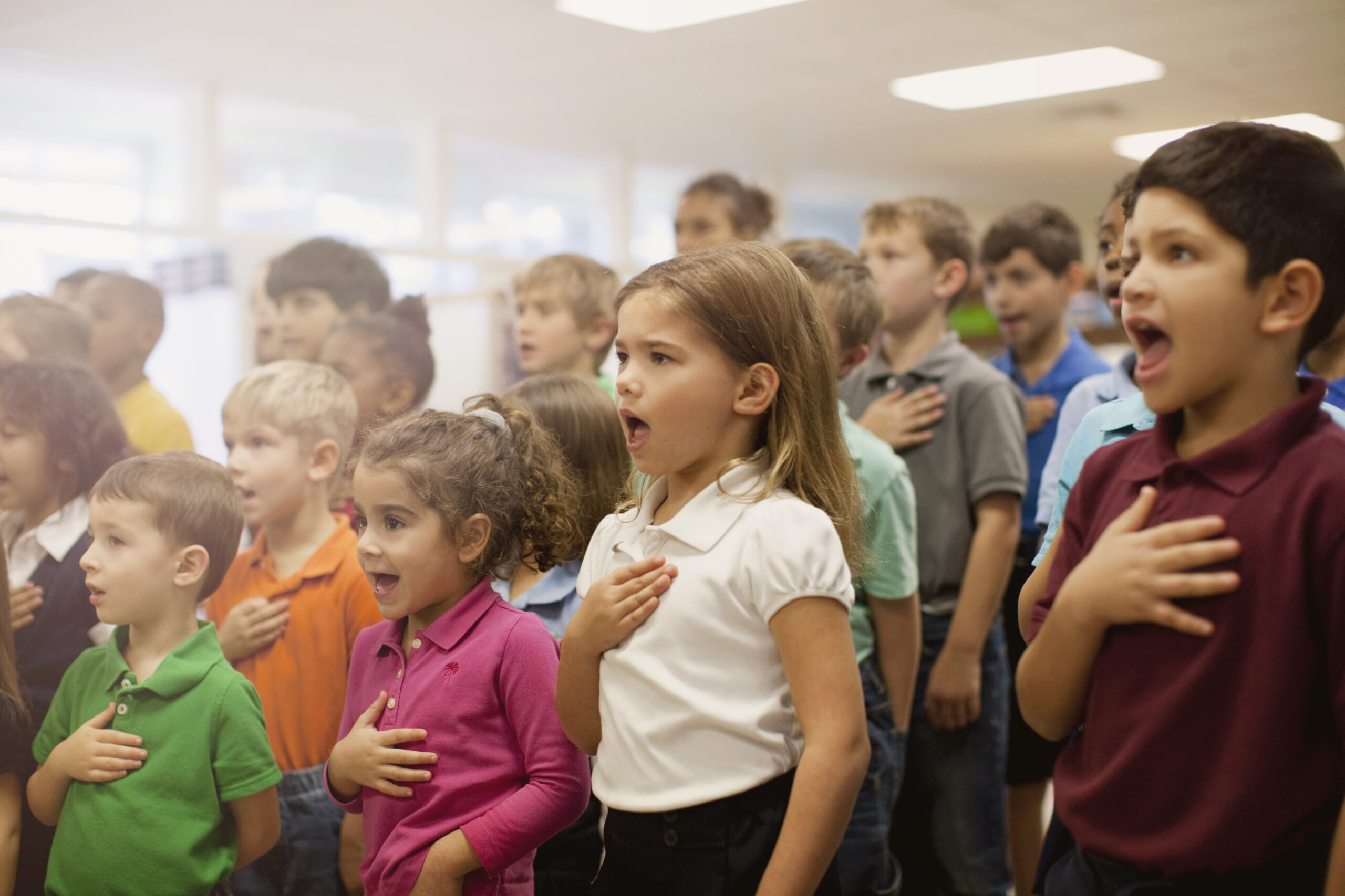 Children reciting Pledge of Allegiance in school